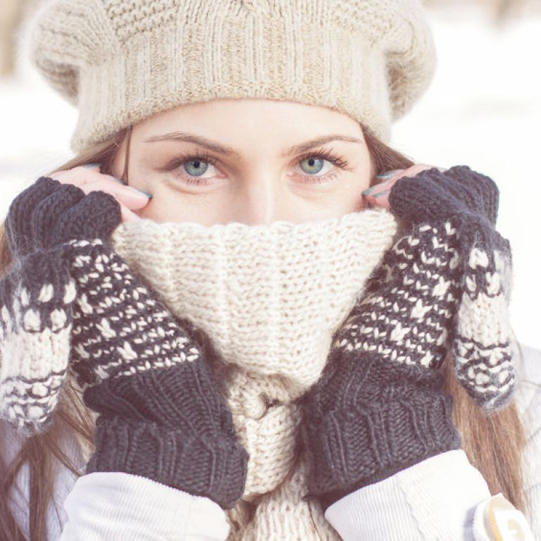 43474231 - winter portrait of female with beautiful blue eyes outdoor
